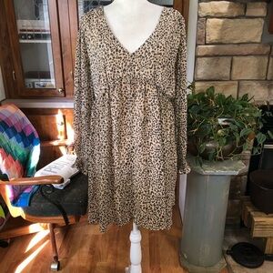 NWT KORI AMERICA SIZE LARGE  ANIMAL PRINT BABY DOLL DRESS LINED EXCEPT SLEEVES.